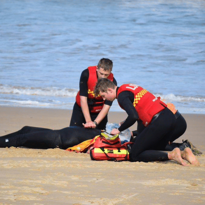 lifesavers demonstrating CPR